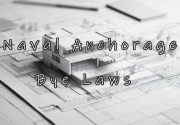 Architectural model of modern house on blueprints.